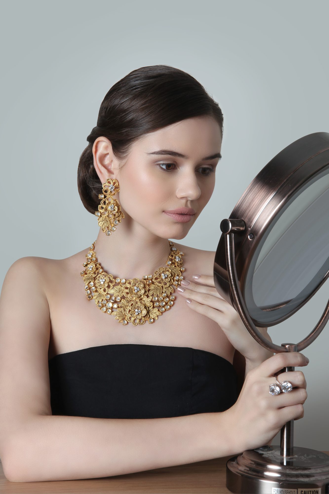Finished gold floral necklace, worn